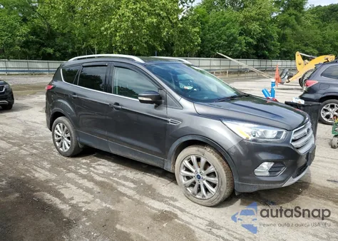 2017 Ford Escape Titanium z USA, uszkodzony, nr VIN 1FMCU9JD9HUB78027